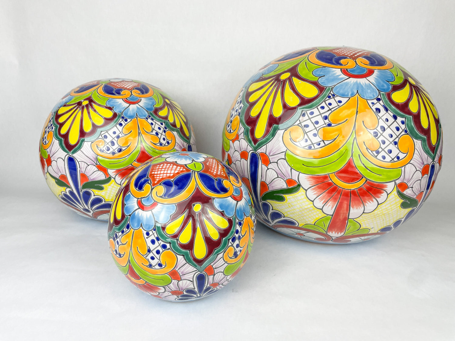 Talavera dinnerware set displaying vibrant Mexican patterns and beautiful colors