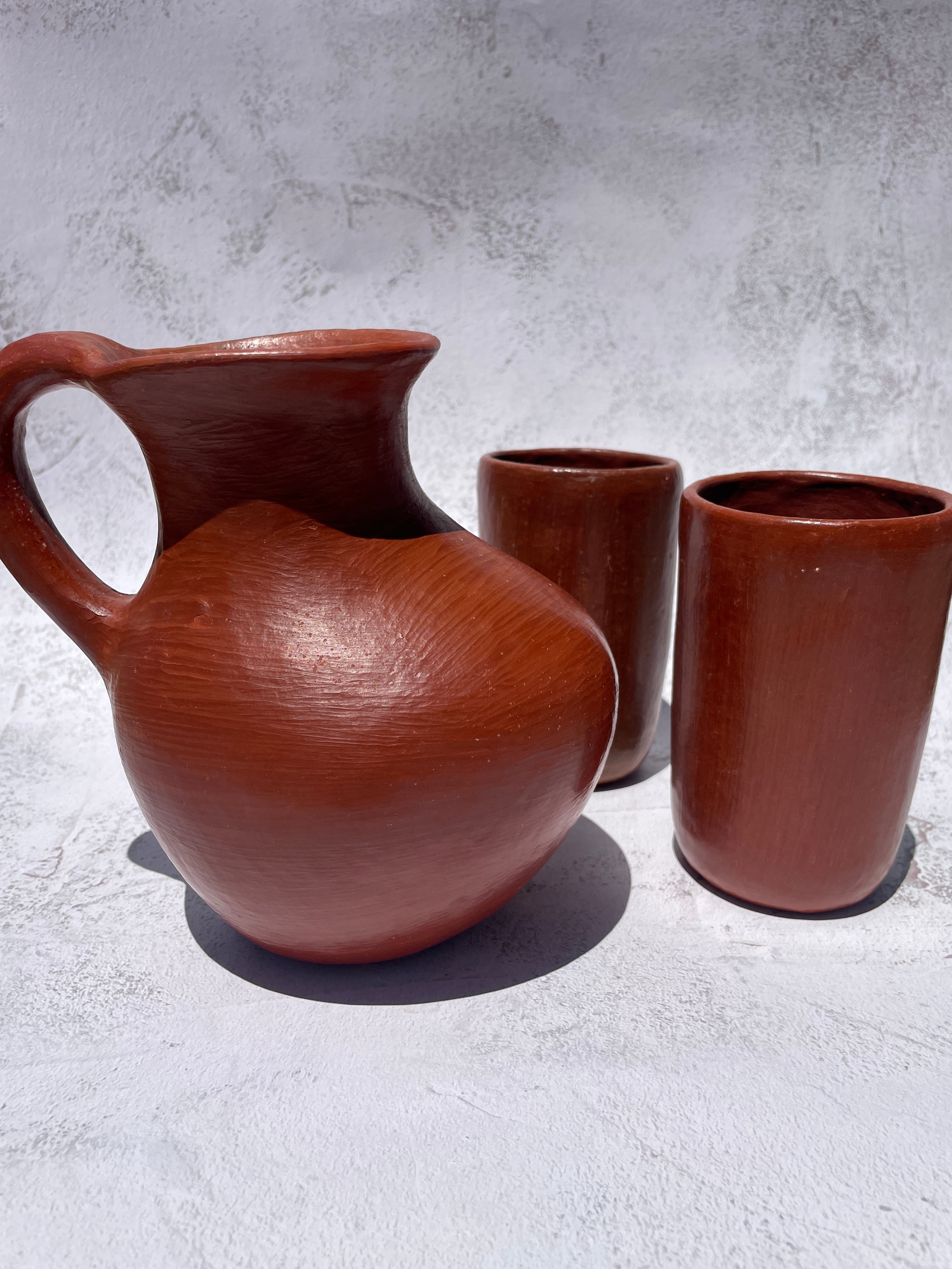 Pottery pitcher selling